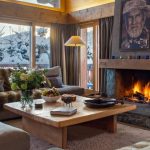 A living room filled with furniture and a fire place