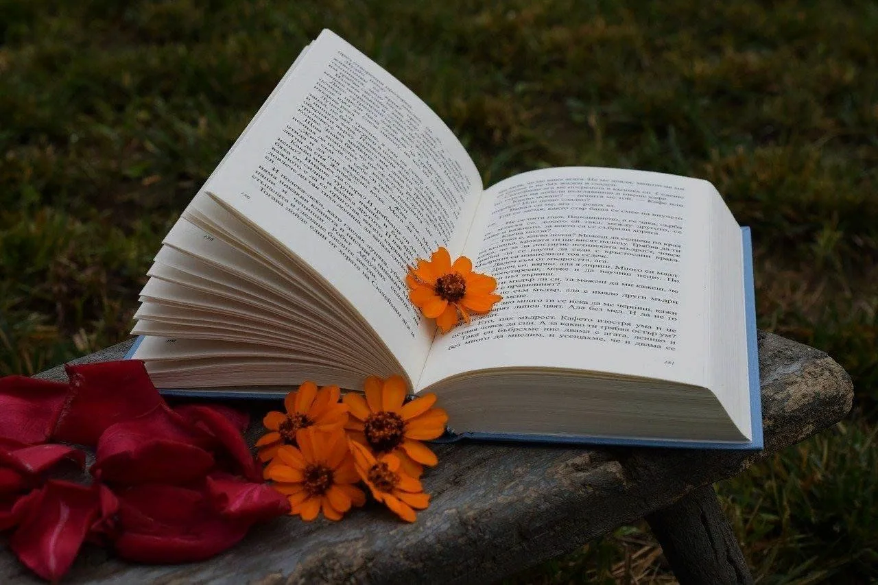 open book with flower