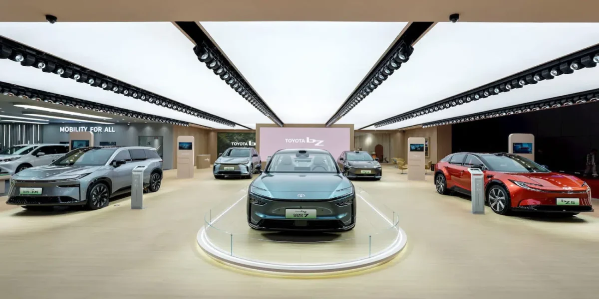 A bunch of cars are on display in a showroom